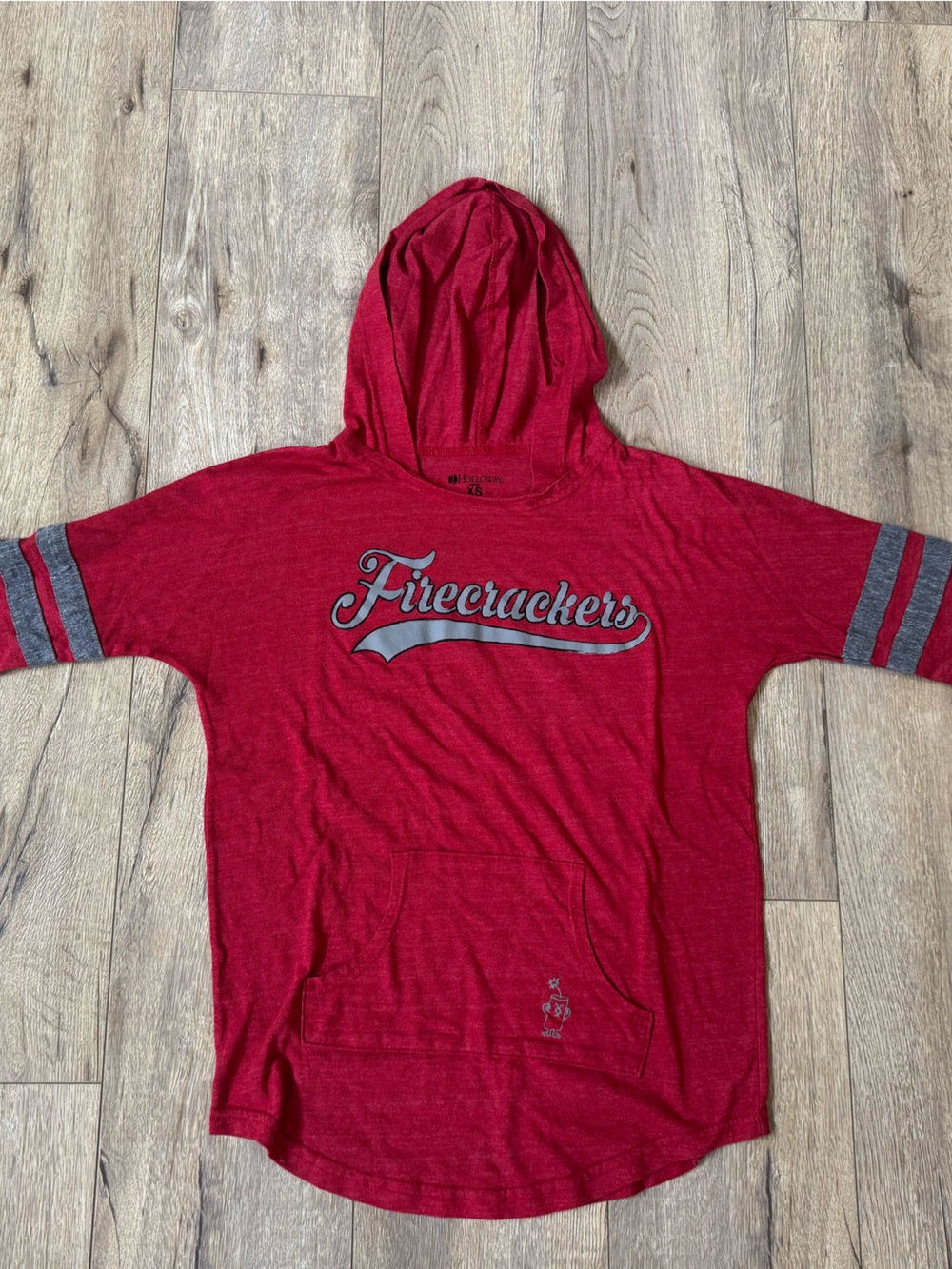 Firecrackers softball women’s Red Hooded Pullover w/Gray Stripe Accents